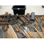 An interesting lot of joinery items including wooden clamps, oil stones, rules etc.