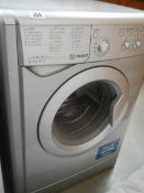 A grey Hotpoint Aquarius VTD20 tumble drier (exhaust tubing required).