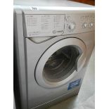 A grey Hotpoint Aquarius VTD20 tumble drier (exhaust tubing required).