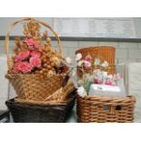 A mixed lot of small wicker baskets with small plastic trays, cup mats and handkerchiefs.