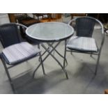 A glass top garden table and 2 chairs,.