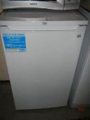 A white Beko fridge.