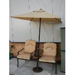 A 2 seat garden table with sunshade.