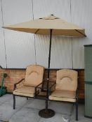 A 2 seat garden table with sunshade.