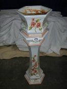 An Italian floral jardiniere on stand, 75 cm tall.