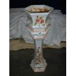 An Italian floral jardiniere on stand, 75 cm tall.