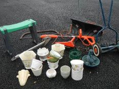 A good lot of garden tools including electric hoe, chain saw, snow scoop etc.