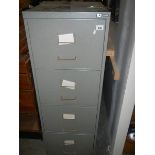 A grey metal filing cabinet.