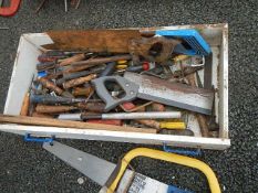 A quantity of old saws, chisels etc.