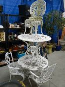 4 cast alloy chairs and 2 tables (80cm diameter)