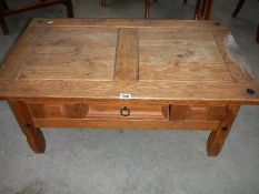 A pine table with drawer, 100 x 60 cm, 45 cm high.