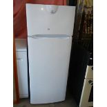 An indesit fridge freezer (needs cleaning).