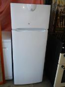 An indesit fridge freezer (needs cleaning).