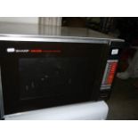 A large Sharp microwave oven.