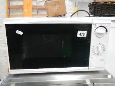 A Tesco 700w microwave oven.