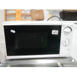 A Tesco 700w microwave oven.