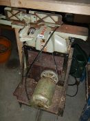 A vintage belt driven Myford surface planer in working order.