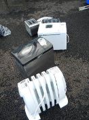 An 'as new' De Longhi oil radiator, 2 bread makers,