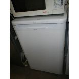 An Indesit under counter fridge.