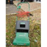 A Qualcast lawn raker 35.