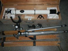 A vintage 220-234 power telescope and 2 tripods, condition and completeness not known.