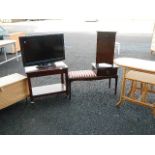 A Panasonic 32" TV, a telephone table and 3 others.