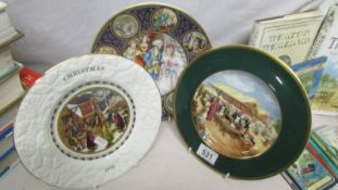 A Royal Worcester 'The Penny Bazaar' plate, A Coalport 1976 Christmas plate and a Limoges plate.