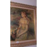 A gilt framed portrait of a lady.