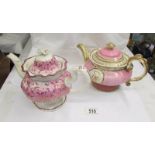 A Victorian lustre teapot and one other.