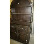 An oak arched top dresser.