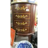 A superb quality mahogany inlaid four drawer inlaid chest.