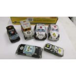 Six vintage tin plate police cars.