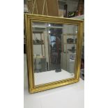 A bevel edged gilt framed mirror, 60 x 50 cm (Collect only).