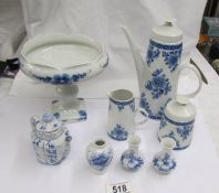 A blue and white coffee pot,