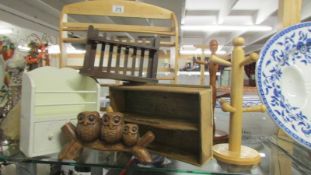 A mixed lot of wooden items including pipe rack, owls, cutlery tray, mug racks etc.