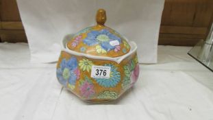 A floral decorated lidded tureen.