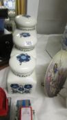 A set of three Taunton Vale pottery storage jars.