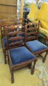 A set of six oak ladder back chairs.