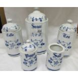 A set of blue and white storage jars, Sugar, tea, coffee, salt and pepper.