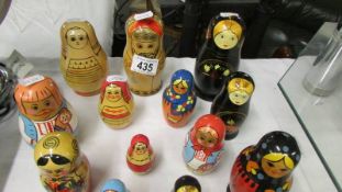 A mixed lot of Russian dolls, various sizes.
