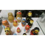 A mixed lot of Russian dolls, various sizes.