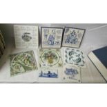 Eight old ceramic tiles.