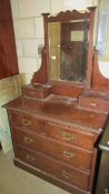 An Edwardian mahogany dressing table.