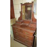 An Edwardian mahogany dressing table.