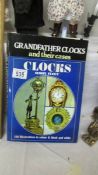 Two books relating to clocks.