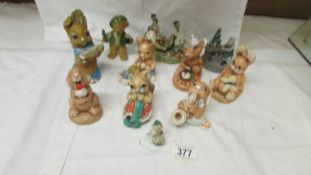 Seven Pendelfin figures and other figures.