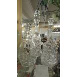 Three cut glass decanters.