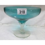 A blue glass footed bowl.