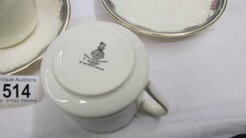 A Royal Doulton 'Albany' pattern coffee set (missing sugar bowl). - Image 4 of 4