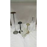 Three Edwardian hat stands, an acrylic hat stand and an acrylic hand shaped ring stand.